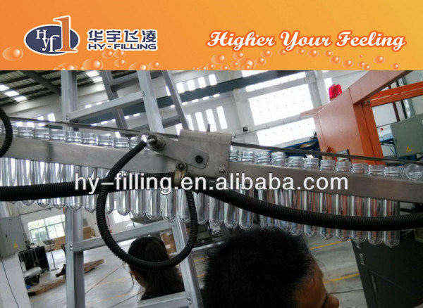 Hy-Filling Automatic with Manual Loading Automatic and Bottle Application Pet Bottle Blowing Machine